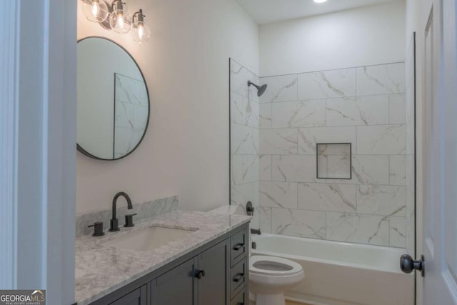 full bathroom featuring  shower combination, toilet, and vanity