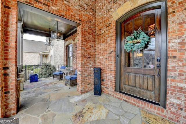 doorway to property with a porch