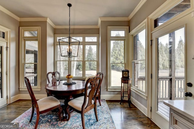 sunroom with a chandelier