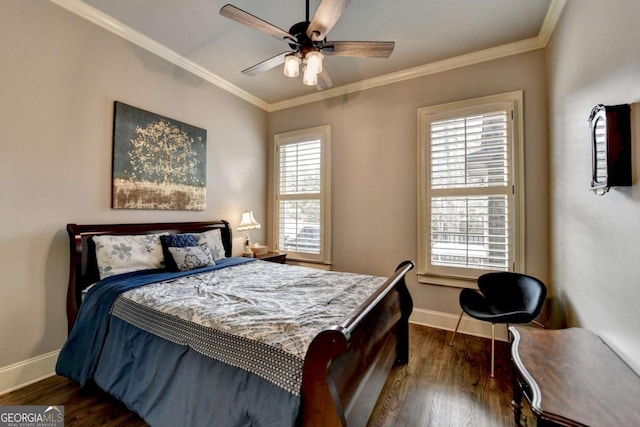 bedroom featuring a ceiling fan, baseboards, dark wood finished floors, and crown molding