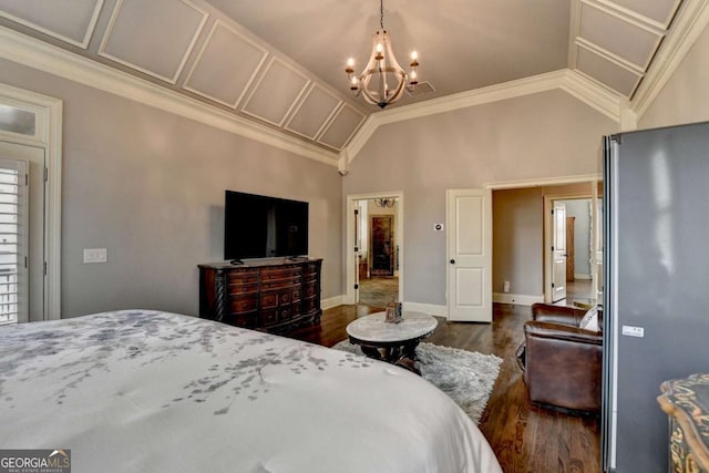 bedroom featuring crown molding, a notable chandelier, lofted ceiling, dark wood-type flooring, and baseboards