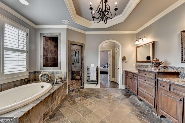 full bath with a bath, a stall shower, visible vents, and crown molding