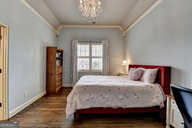 bedroom featuring a notable chandelier, dark wood-type flooring, visible vents, baseboards, and ornamental molding