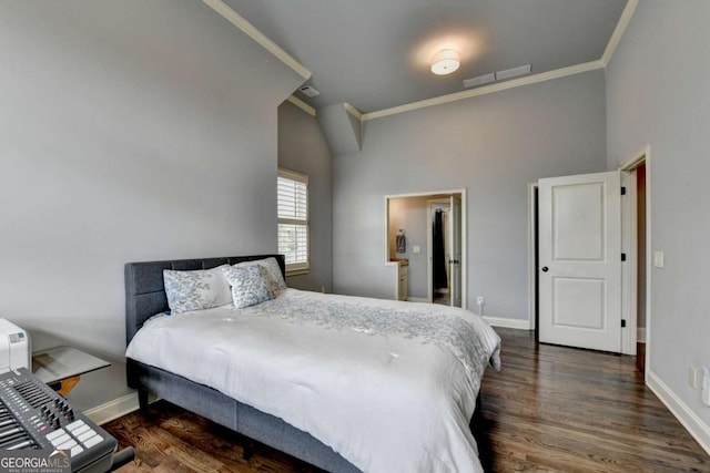 bedroom featuring ornamental molding, visible vents, baseboards, and wood finished floors