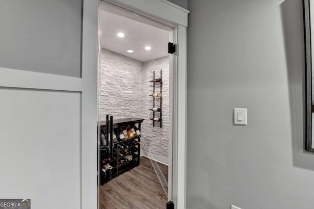 wine room featuring wood finished floors