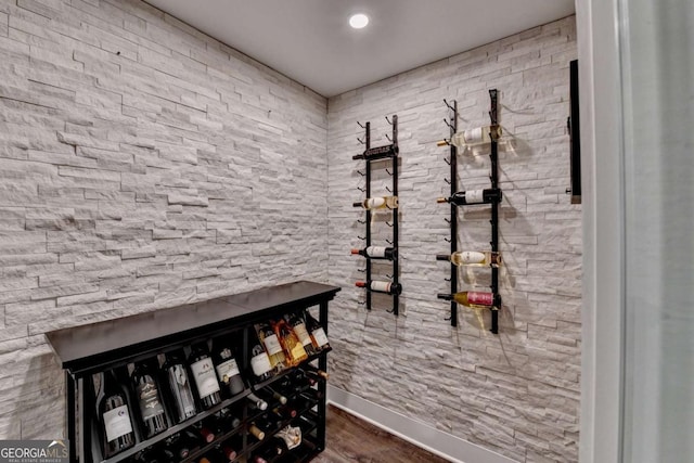 wine room featuring wood finished floors