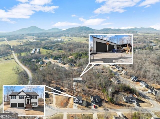 birds eye view of property with a mountain view