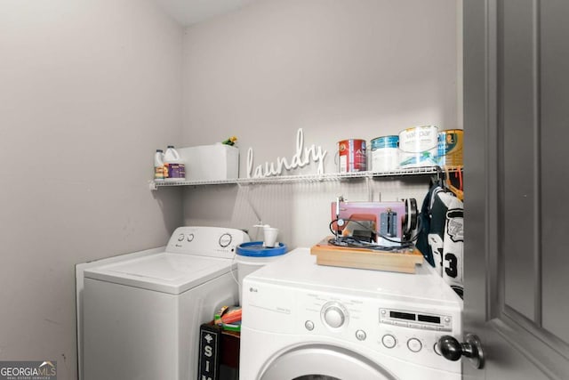 8718 Shade Tree Ct, Clermont, GA 30527 - laundry room featuring washing machine and dryer