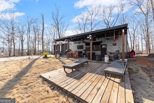 8718 Shade Tree Ct, Clermont, GA 30527 - wooden terrace featuring ceiling fan