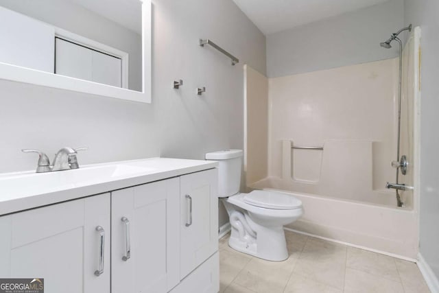 bathroom featuring toilet, tile patterned flooring, tub / shower combination, and vanity