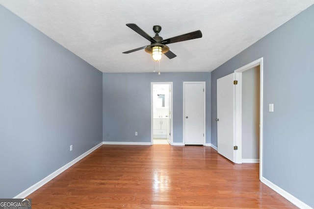 37 Indian Hills Ct, Dallas, GA 30157 - unfurnished room with ceiling fan and wood finished floors
