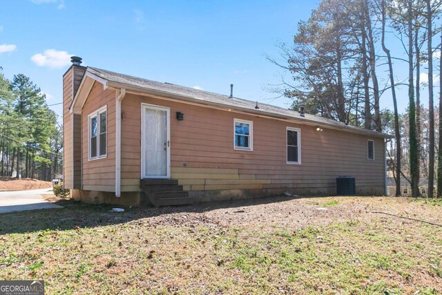 37 Indian Hills Ct, Dallas, GA 30157 - back of property with entry steps and a chimney