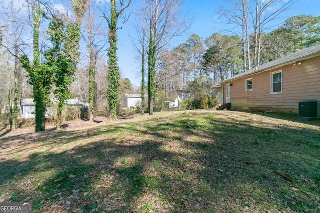 view of yard featuring central AC