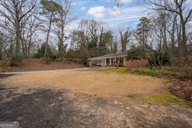 view of yard with a porch