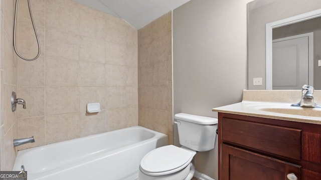full bath featuring vanity, toilet, and bathtub / shower combination