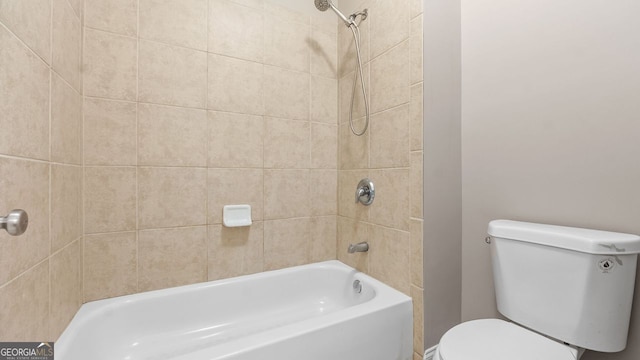 bathroom with toilet and shower / bathtub combination