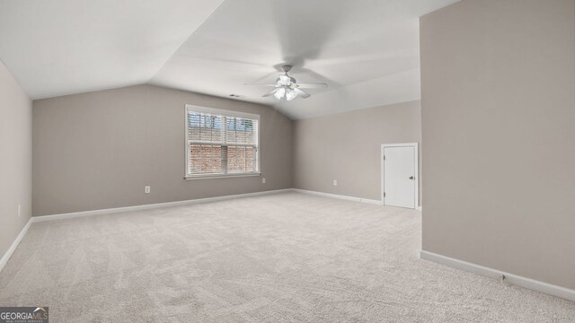 bonus room with carpet flooring, baseboards, a ceiling fan, and lofted ceiling