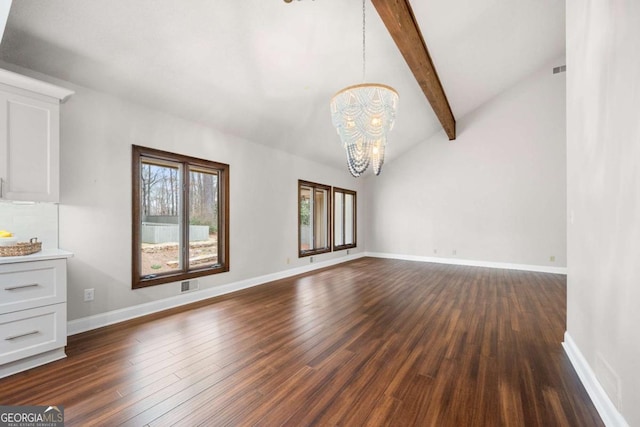 unfurnished living room featuring a chandelier, dark wood-style flooring, visible vents, and baseboards