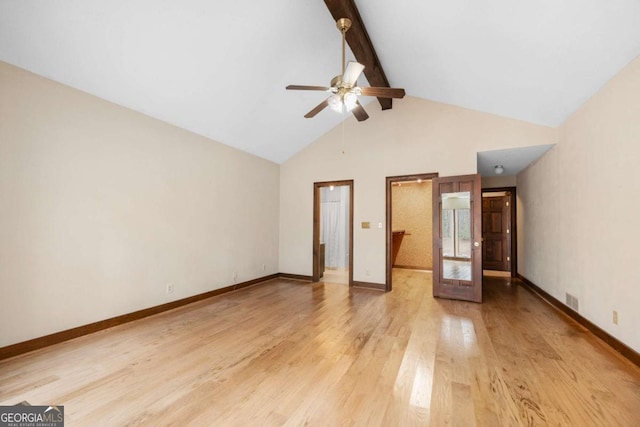 unfurnished bedroom featuring high vaulted ceiling, light wood-style floors, baseboards, and beam ceiling