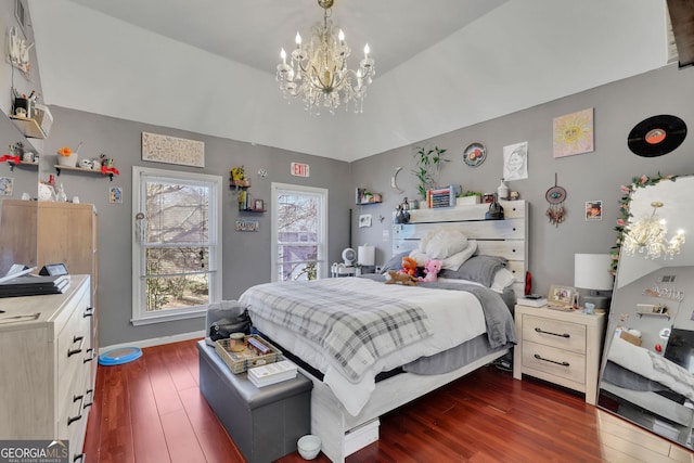 bedroom featuring lofted ceiling, a notable chandelier, baseboards, and dark wood-type flooring