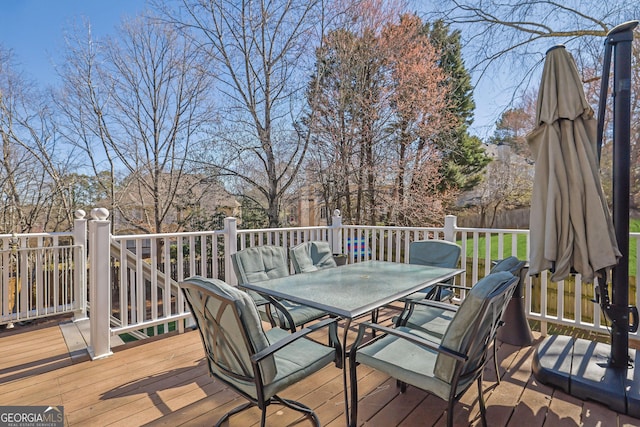 deck with outdoor dining space