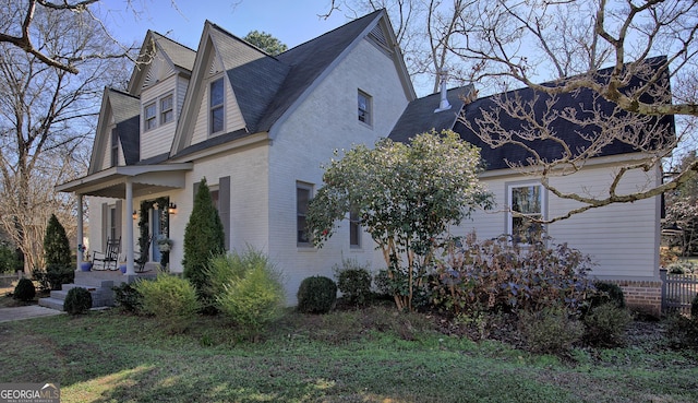 view of home's exterior featuring brick siding