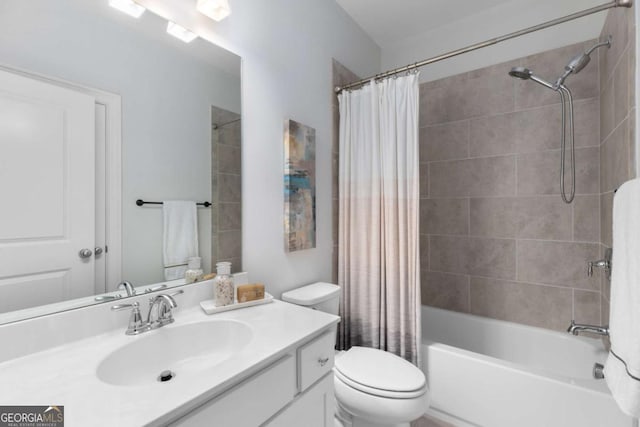 full bath with vanity, toilet, and shower / tub combo with curtain