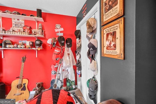 interior space featuring a textured ceiling