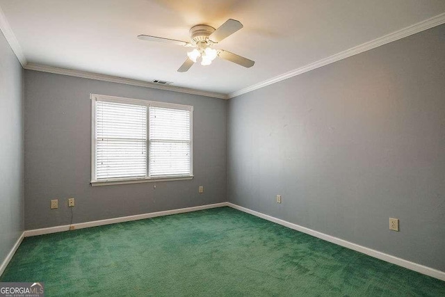 unfurnished room with baseboards, crown molding, visible vents, and carpet flooring