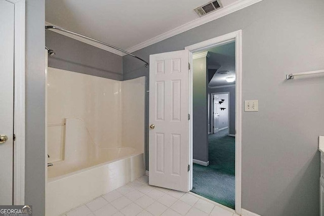 full bathroom featuring visible vents, crown molding, tile patterned floors, and shower / washtub combination