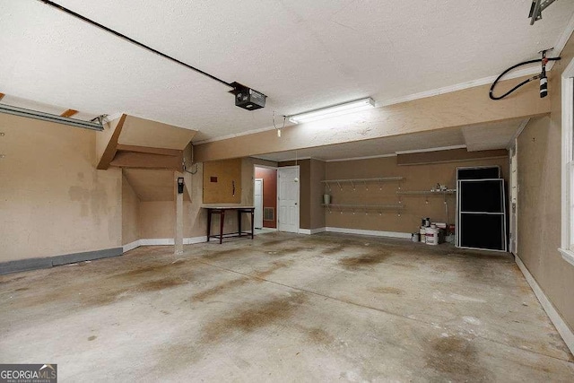 garage featuring baseboards and a garage door opener