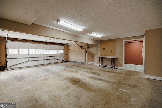 garage featuring baseboards