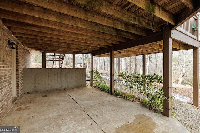 view of patio / terrace featuring an outdoor structure and an exterior structure