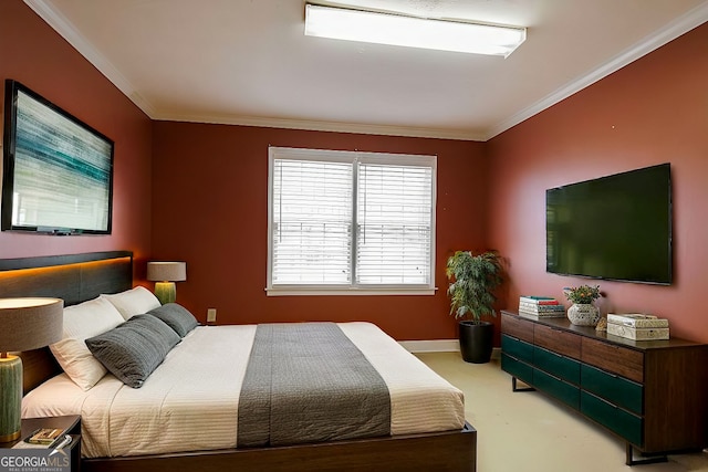 bedroom featuring baseboards and ornamental molding