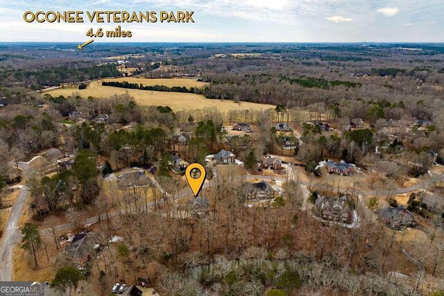 bird's eye view featuring a forest view