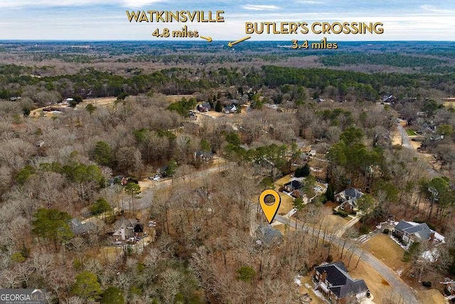 drone / aerial view with a forest view