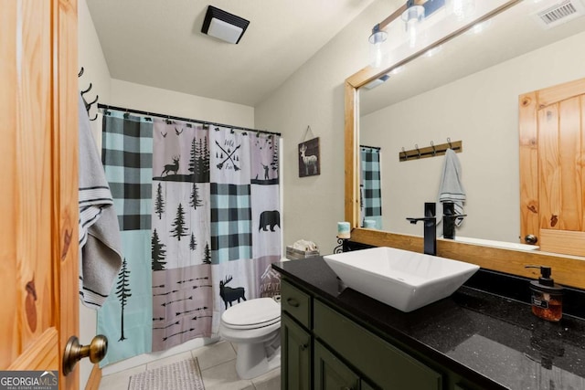 full bath with vanity, toilet, tile patterned floors, curtained shower, and visible vents