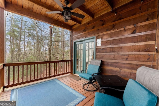 wooden terrace with french doors and ceiling fan