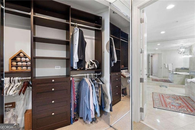 walk in closet featuring tile patterned floors