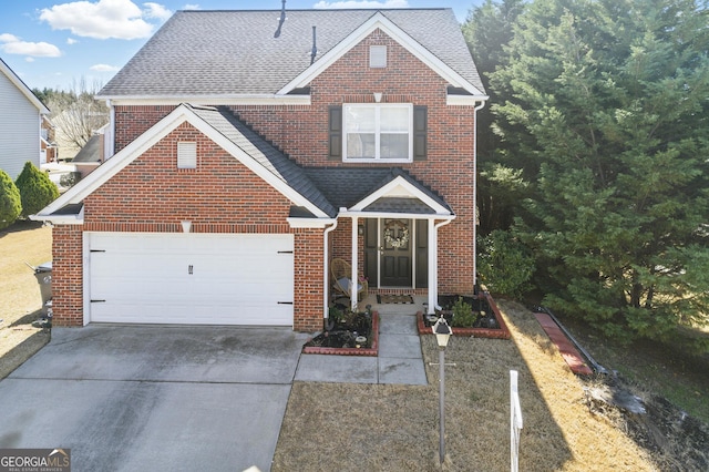 traditional home featuring brick siding, driveway, and an attached garage