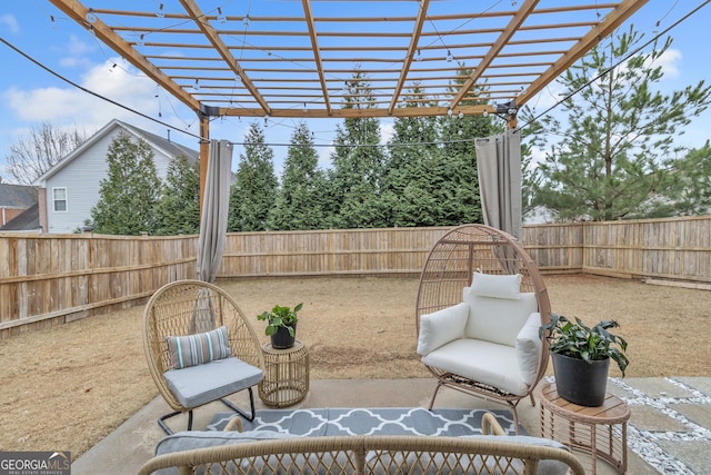 view of patio / terrace with a pergola and a fenced backyard