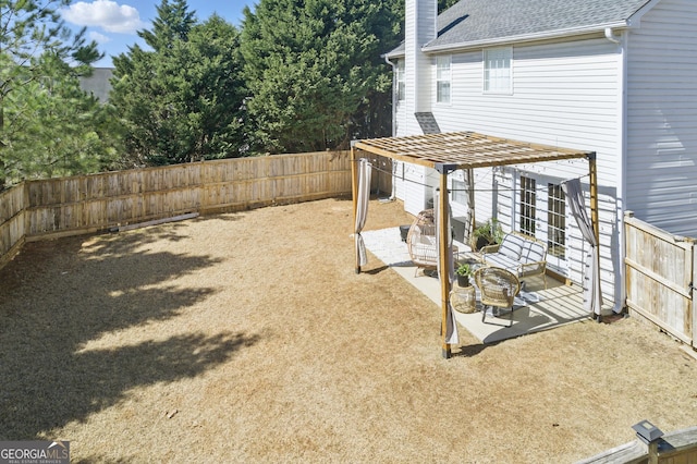 view of yard with a patio and a fenced backyard