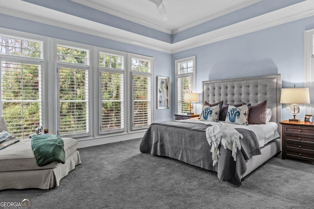 carpeted bedroom featuring crown molding