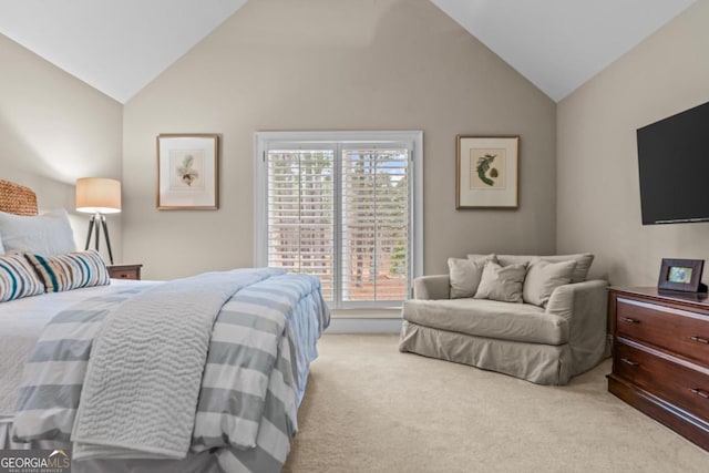 bedroom featuring carpet floors and vaulted ceiling