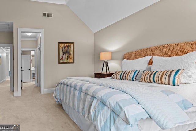 carpeted bedroom featuring high vaulted ceiling, attic access, visible vents, and baseboards