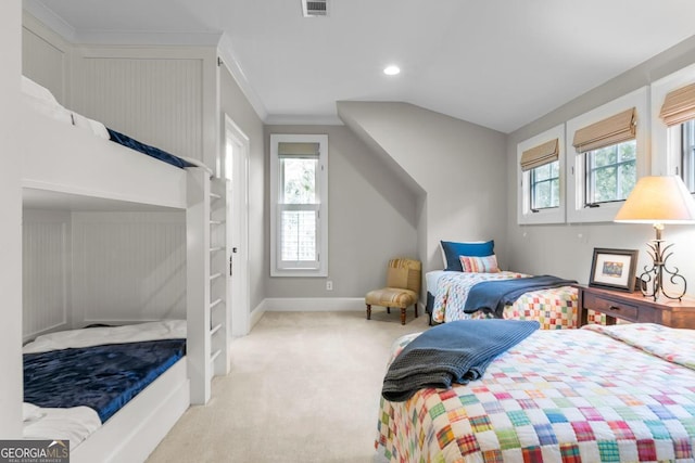 bedroom featuring ornamental molding, carpet, multiple windows, and baseboards