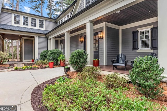 doorway to property with a porch