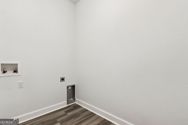 laundry room with hookup for a washing machine, dark wood-style floors, baseboards, hookup for an electric dryer, and laundry area