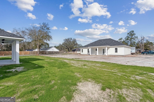 view of yard featuring fence