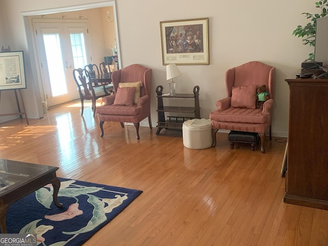 living area with light wood-style flooring